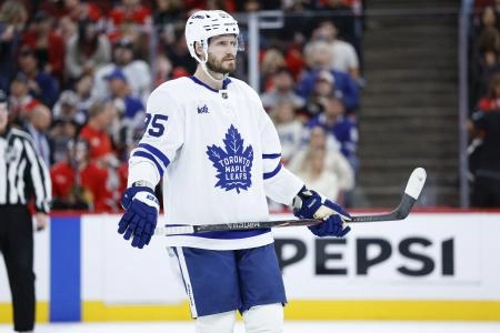 Nov 15, 2025; Chicago, Illinois, USA; Toronto Maple Leafs defenseman Oliver Ekman-Larsson (95) looks on during the first period at United Center