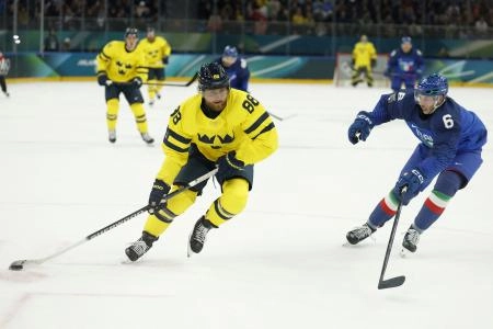 Feb 11, 2026; Milan, Italy; William Nylander of Sweden in action with Jason Seed of Italy in men's ice hockey group B play during the Milano Cortina 2026 Olympic Winter Games at Milano Santagiulia Ice Hockey Arena. Mandatory Credit: Geoff Burke-Imagn Images