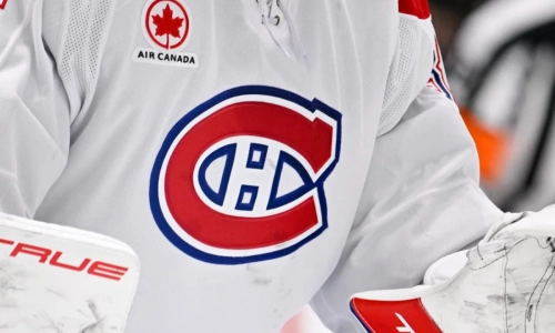 Jan 4, 2026; Dallas, Texas, USA; A view of the logo on the jersey of Montreal Canadiens goaltender during the game between the Stars and the Canadiens at the American Airlines Center.