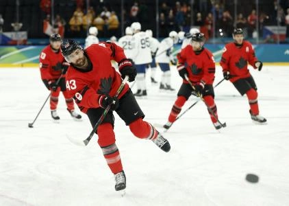 Feb 15, 2026; Milan, Italy; Tom Wilson of Canada during the warm up before the match against France in men's ice hockey group A play during the Milano Cortina 2026 Olympic Winter Games at Milano Santagiulia Ice Hockey Arena.