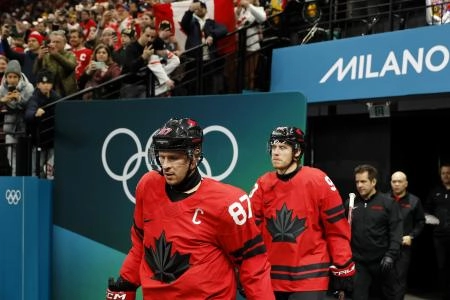 Feb 18, 2026; Milan, Italy; Sidney Crosby of Canada walks out to the ice before a men's ice hockey quarterfinal during the Milano Cortina 2026 Olympic Winter Games at Milano Santagiulia Ice Hockey Arena.
