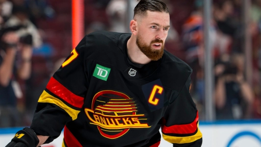 Jan 17, 2026; Vancouver, British Columbia, CAN; Vancouver Canucks defenseman Filip Hronek (17) skates during warm ups prior to a game against the Edmonton Oilers at Rogers Arena.
