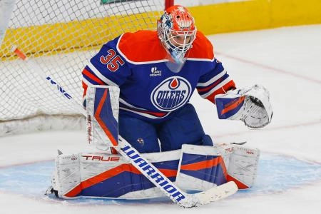 May 25, 2025; Edmonton, Alberta, CAN; Edmonton Oilers goaltender Olivier Rodrigue (35) makes a save during warmup against the Dallas Stars in game three of the Western Conference Final of the 2025 Stanley Cup Playoffs at Rogers Place.