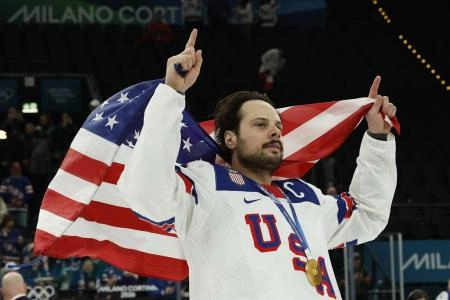 Feb 22, 2026; Milan, Italy; Auston Matthews #34 of Team United States celebrates after the game against Team Canada during the Milano Cortina 2026 Olympic Winter Games at Milano Santagiulia Ice Hockey Arena. Mandatory Credit: Geoff Burke-Imagn Images