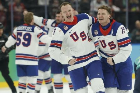 Feb 22, 2026; Milan, Italy; Brady Tkachuk #7 of Team United States and Matthew Tkachuk #19 of Team United States celebrate after their game against Team Canada during the Milano Cortina 2026 Olympic Winter Games at Milano Santagiulia Ice Hockey Arena.