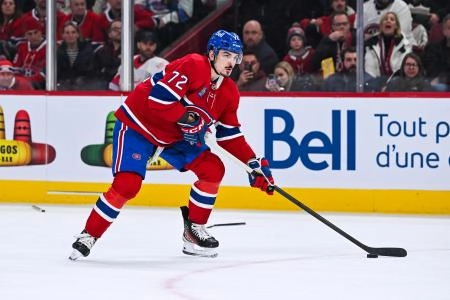 Jan 10, 2026; Montreal, Quebec, CAN; Montreal Canadiens defenseman Arber Xhekaj (72) plays the puck against the Detroit Red Wings during the third period at Bell Centre.