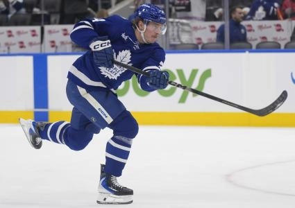 Jan 27, 2026; Toronto, Ontario, CAN; Toronto Maple Leafs forward Bobby McMann (74) shoots the puck during warm up before a game against the Buffalo Sabres at Scotiabank Arena. Mandatory Credit: John E. Sokolowski-Imagn Images