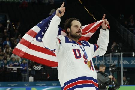 Feb 22, 2026; Milan, Italy; Auston Matthews #34 of Team United States celebrates after the game against Team Canada during the Milano Cortina 2026 Olympic Winter Games at Milano Santagiulia Ice Hockey Arena. Mandatory Credit: Geoff Burke-Imagn Images