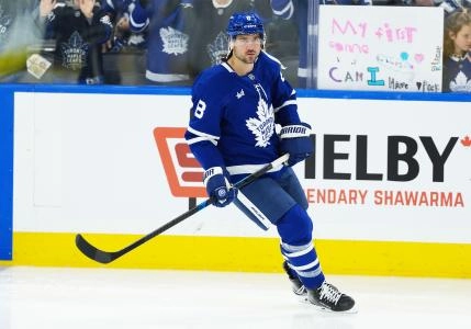 Oct 18, 2025; Toronto, Ontario, CAN; Toronto Maple Leafs defenseman Chris Tanev (8) skates during the warmup before a game against the Seattle Kraken at Scotiabank Arena. Mandatory Credit: Nick Turchiaro-Imagn Images
