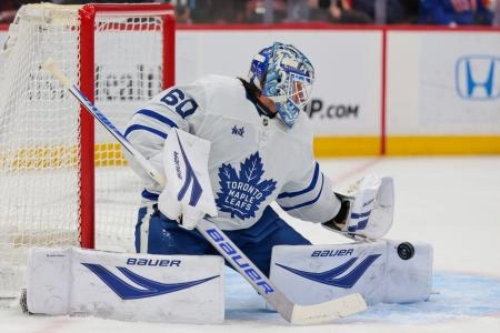Feb 26, 2026; Sunrise, Florida, USA; Toronto Maple Leafs goaltender Joseph Woll (60) makes a save against the Florida Panthers during the first period at Amerant Bank Arena. Mandatory Credit: Sam Navarro-Imagn Images