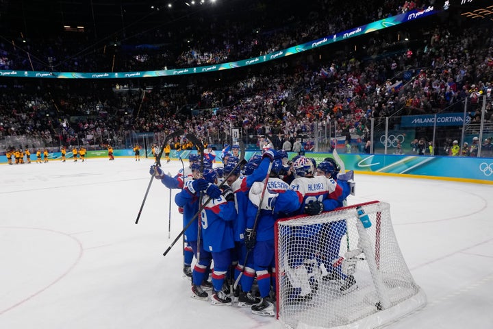 Slovakia players celebrate their victory over Germany in Milan on Wednesday.