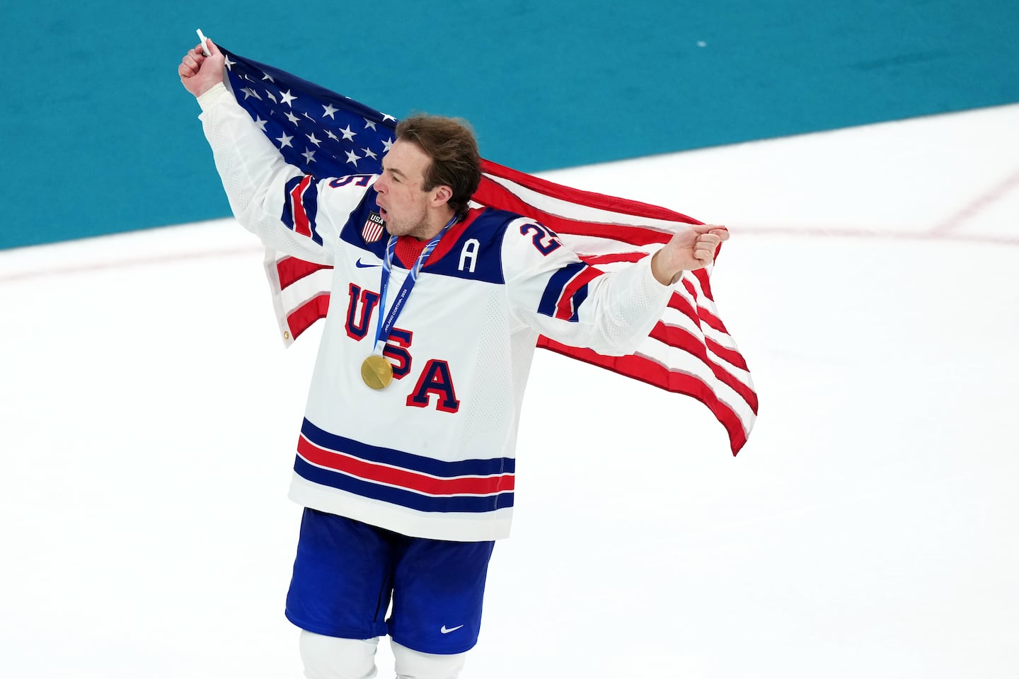 Bruins defenseman Charlie McAvoy and Team USA needed a postgame bouncer after winning gold in Milan.