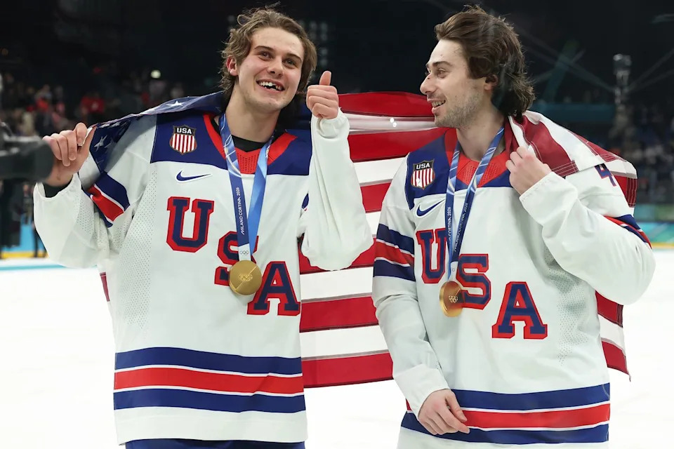 Jack and Quinn Hughes of Team USA celebrate winning the gold medal over Canada in the 2026 Winter Olympics. Elsa/Getty