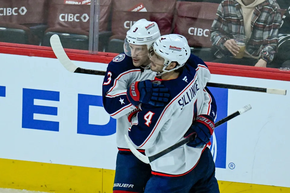 Jan 30, 2026; Chicago, Illinois, USA; Columbus Blue Jackets center Charlie Coyle (3) celebrates with center Cole Sillinger (4) after scoring against the Chicago Blackhawks during the second period at the United Center. Mandatory Credit: Matt Marton-Imagn Images