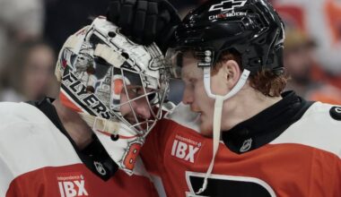 Flyers goalie Dan Vladar (left) and Owen Tippett celebrate after Tuesday's win over the Washington Capitals.