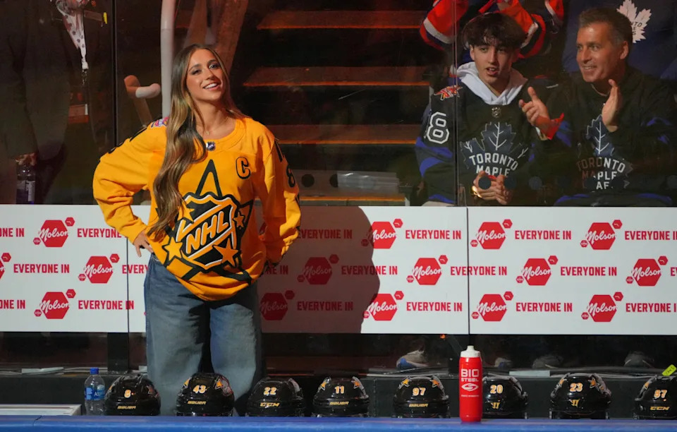 TORONTO, ONTARIO - FEBRUARY 03: Tate McRae of Team MacKinnon looks on from the bench area during player introductions before the 2024 Honda NHL All-Star Game at Scotiabank Arena on February 03, 2024 in Toronto, Ontario, Canada. (Photo by Andre Ringuette/NHLI via Getty Images)Andre Ringuette/Getty Images