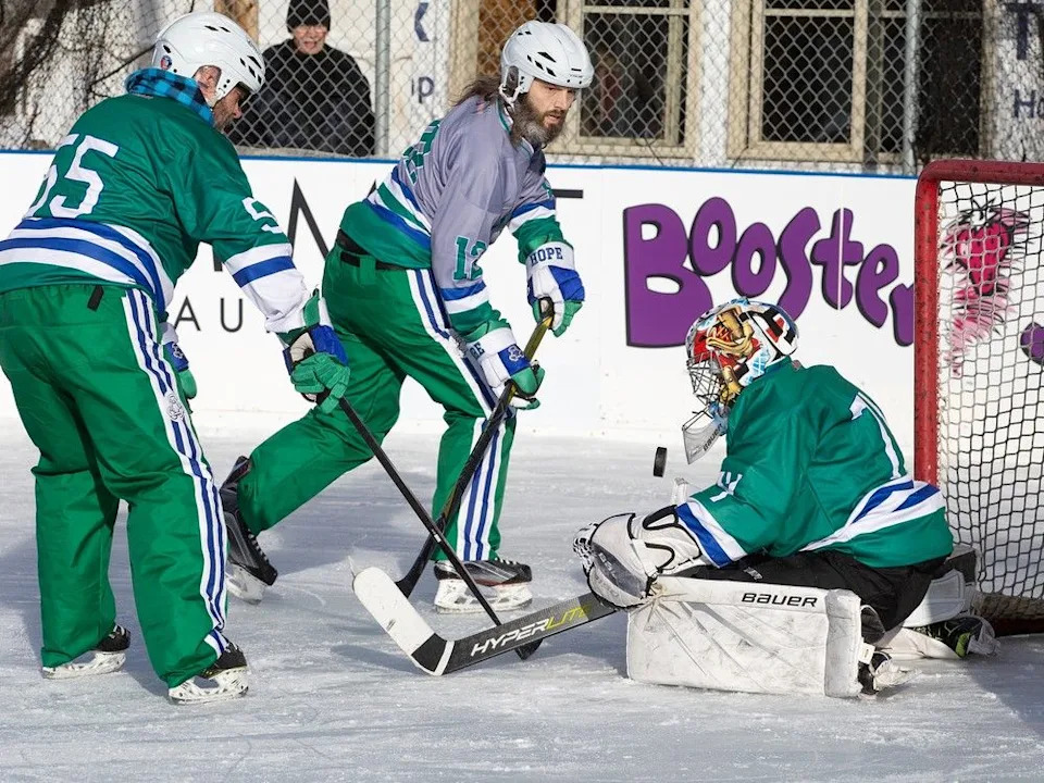  Goaltender Maria Niinimaa makes a save during the World’s Longest Hockey Game at an acreage east of Edmonton, Friday Feb. 6, 2026.