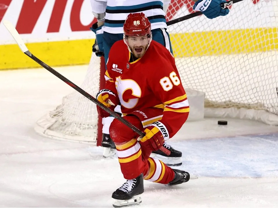  Flames forward Joel Farabee celebrates what stood up as the game-winning goal on Saturday.