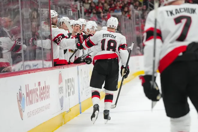 Feb 3, 2026; Raleigh, North Carolina, USA; Ottawa Senators center Tim Stützle (18) celebrates his goal against the Carolina Hurricanes during the second period at Lenovo Center.