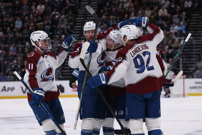 Feb 25, 2026; Salt Lake City, Utah, USA; The Colorado Avalanche celebrate after a goal against the Utah Mammoth by center Martin Necas (88) during the second period at Delta Center.