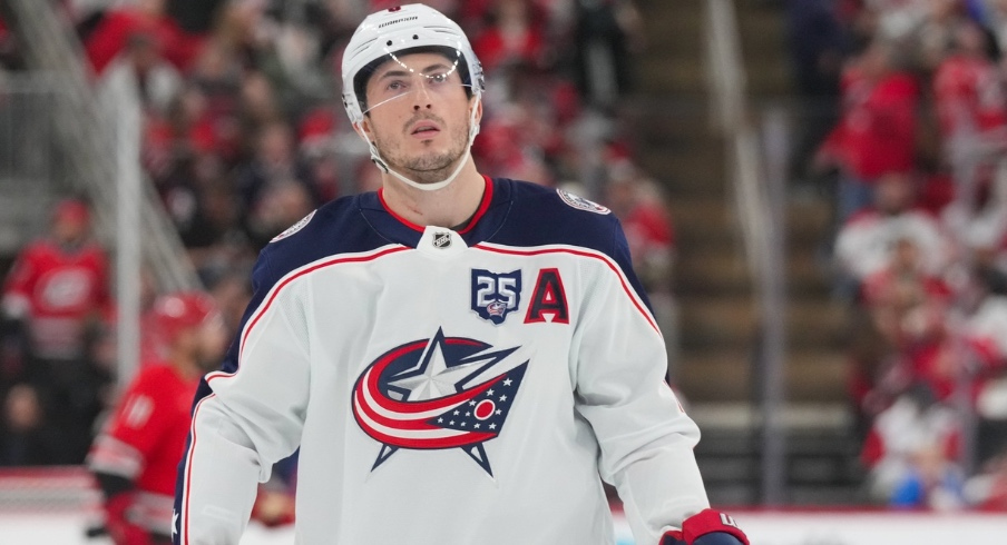 Dec 9, 2025; Raleigh, North Carolina, USA; Columbus Blue Jackets defenseman Zach Werenski (8) looks up against the Carolina Hurricanes during the second period at Lenovo Center.