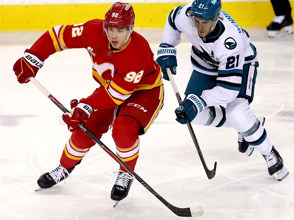  Calgary Flames forward Matvei Gridin plays against the San Jose Sharks in first-period NHL action at the Scotiabank Saddledome in Calgary on Saturday, Jan. 31, 2026.