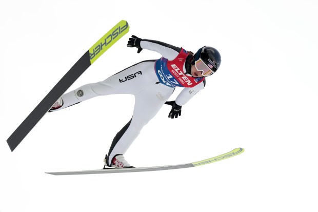 Annika Belshaw, of the United States, soars through the air during her first round jump of the ski jumping women's large hill individual competition at the Nordic World Ski Championships in Trondheim, Norway, Friday, March 7, 2025. (AP Photo/Matthias Schrader)