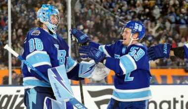 Tampa Bay Lightning goaltender Andrei Vasilevskiy (88) celebrates with center Jake Guentzel (59) after the team defeated the Boston Bruins durring a shootout in a Stadium Series NHL hockey game Sunday, Feb. 1, 2026, in Tampa, Fla. (AP Photo/Chris O'Meara)