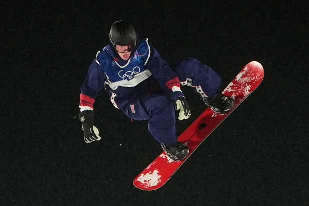 Oliver Martin practices during a snowboard big air training session at the 2026 Winter Olympics, in Livigno, Italy, Wednesday, Feb. 4, 2026. (AP Photo/Lindsey Wasson)