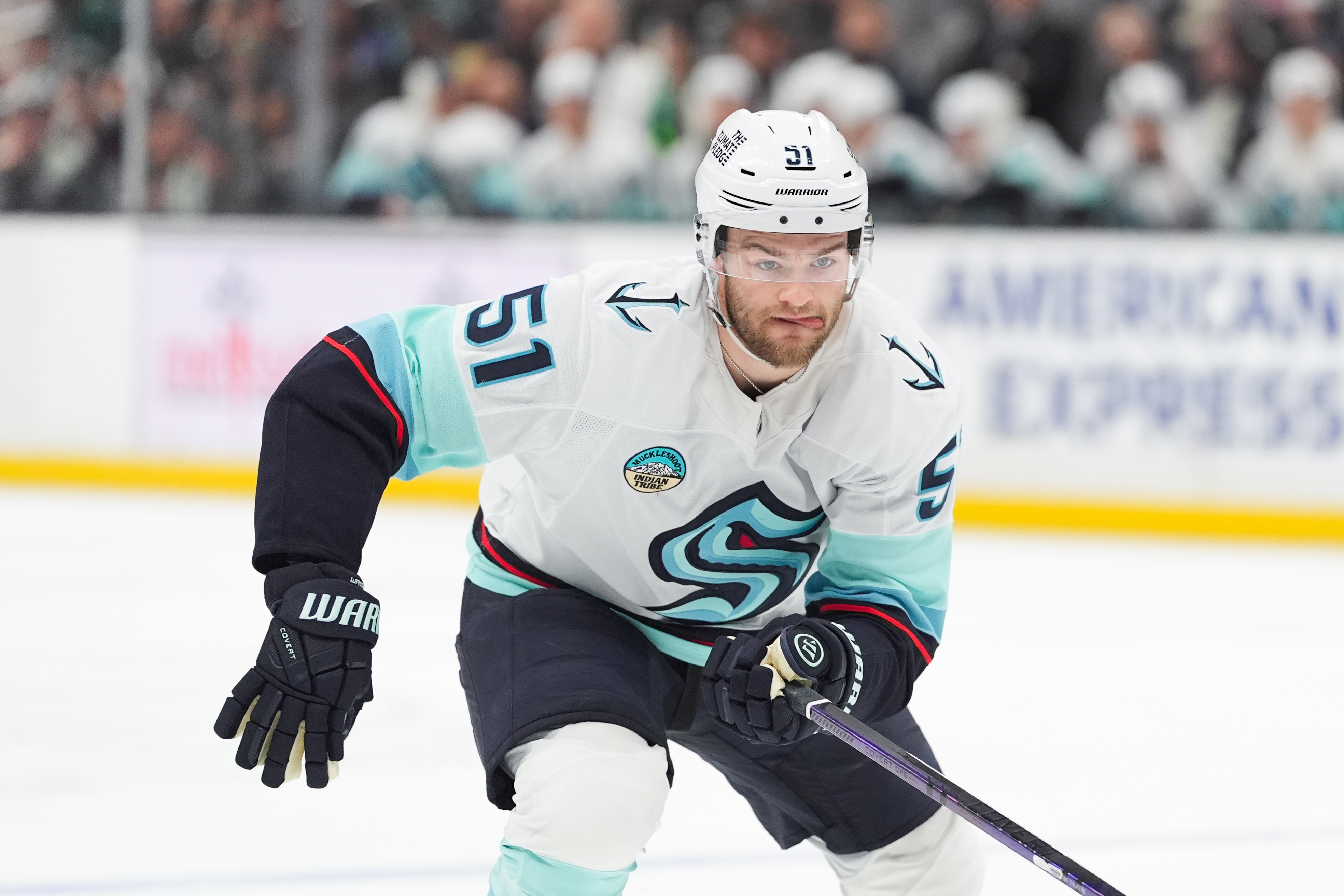 Seattle Kraken center Shane Wright chases the puck during the...