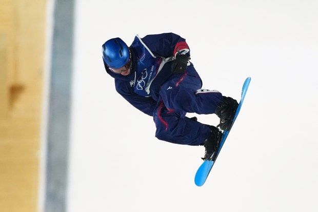Jake Canter competes in big air qualifications at the 2026 Winter Olympics, in Livigno, Italy, Thursday, Feb. 5, 2026. (AP Photo/Gregory Bull)