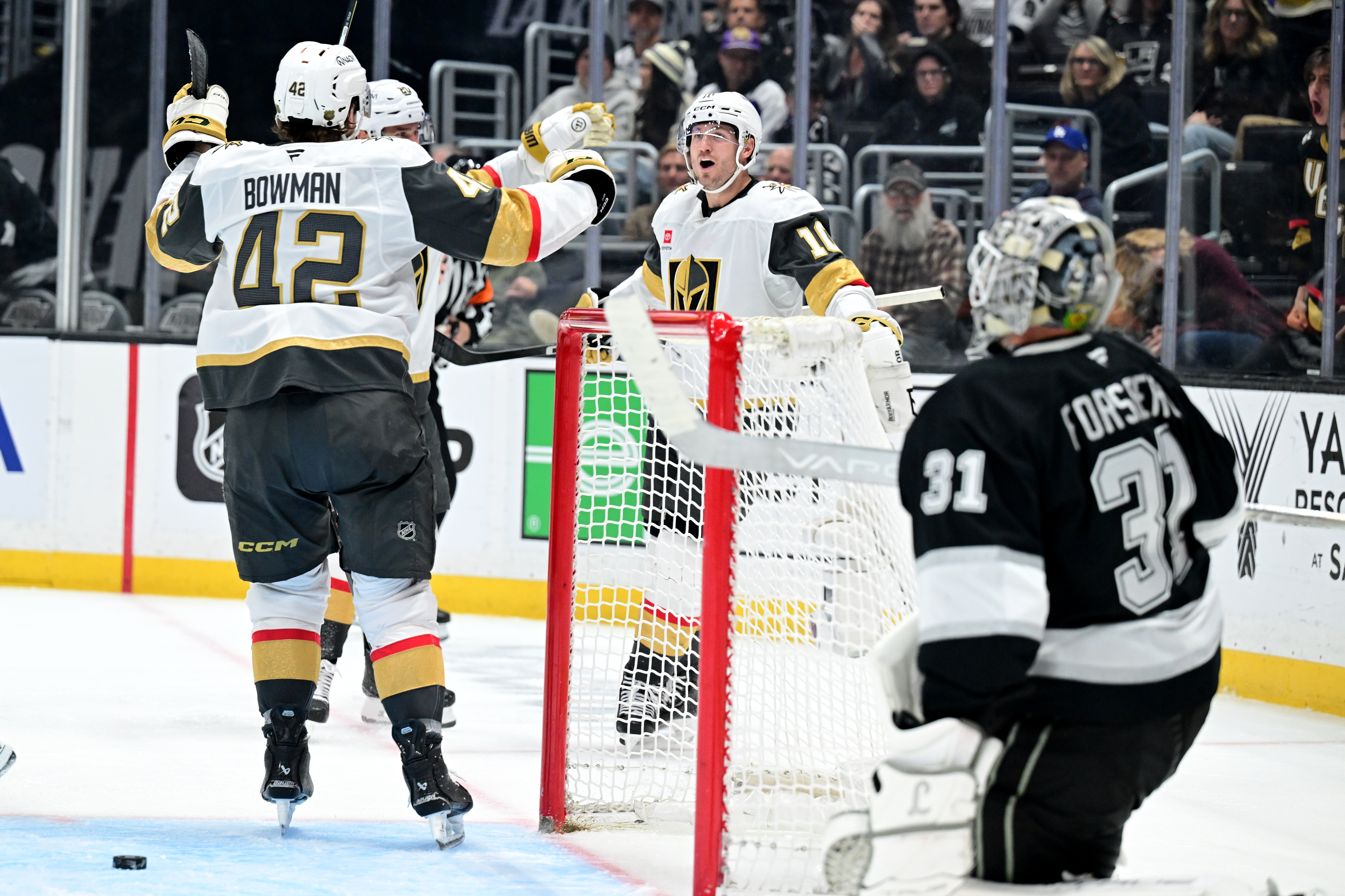 Vegas Golden Knights center Colton Sissons, rear right, celebrates his...