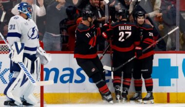 Carolina Hurricanes players celebrate a goal during the first period of its 5-4 win Thursday night against the Tampa Bay Lightning in Raleigh, N.C. (AP Photo/Karl DeBlaker)
