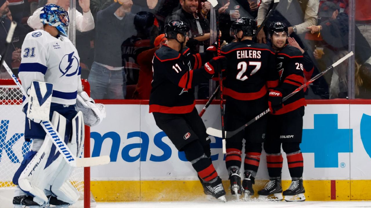 Carolina Hurricanes players celebrate a goal during the first period of its 5-4 win Thursday night against the Tampa Bay Lightning in Raleigh, N.C. (AP Photo/Karl DeBlaker)