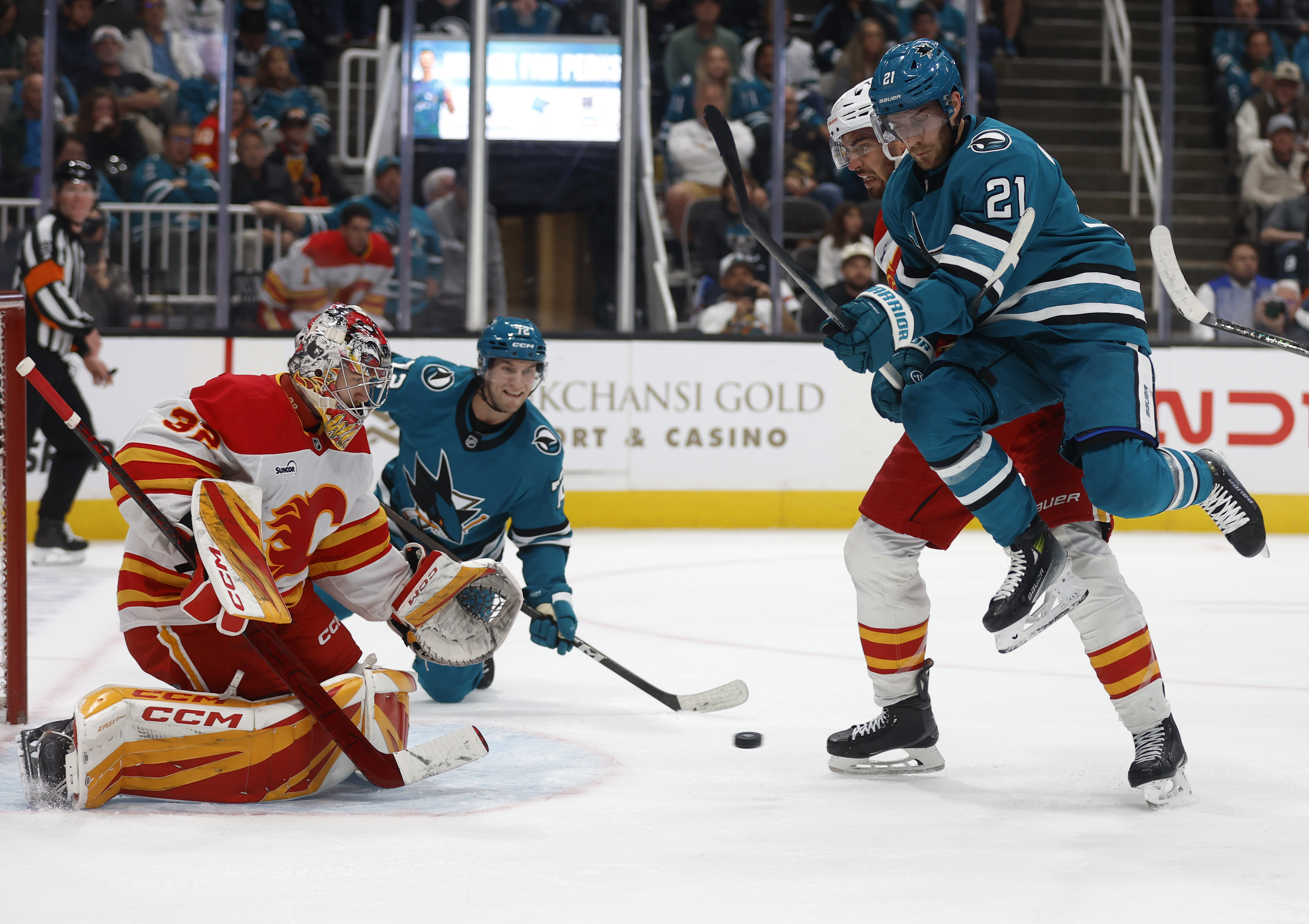 San Jose Sharks' Alexander Wennberg (21) jumps out of the...
