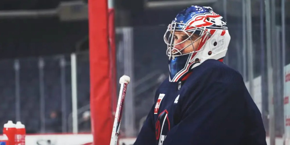 Connor Hellebuyck Jets playoffs