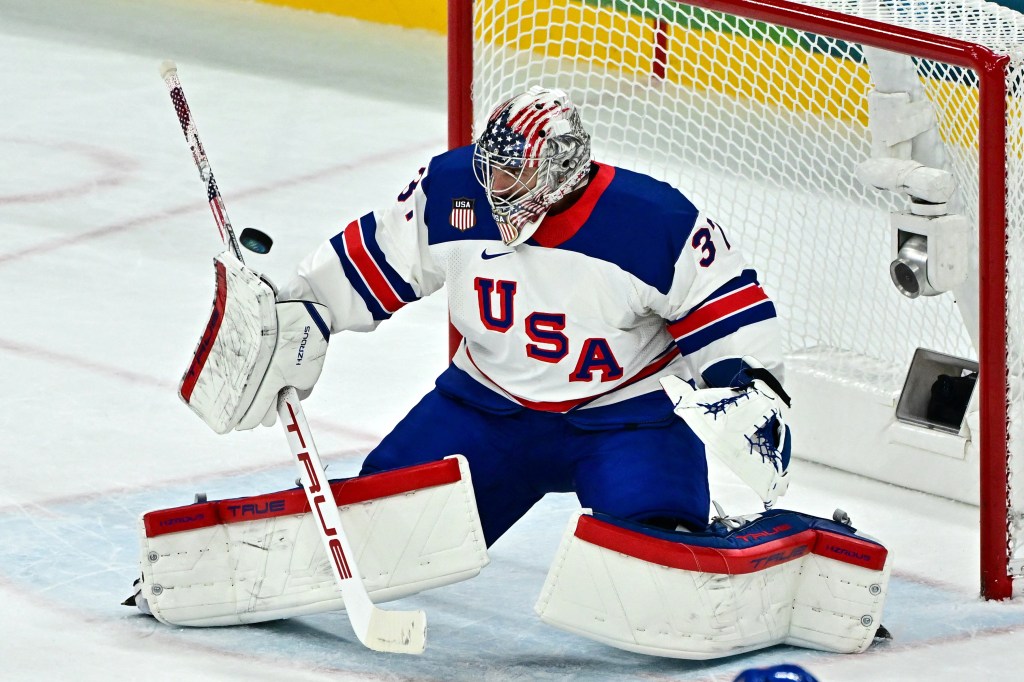 Connor Hellebuyck makes a save during Team USA's win over Germany on Feb. 15, 2026.
