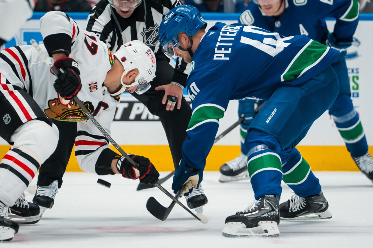 Elias Pettersson Vancouver Canucks Nick Foligno Chicago Blackhawks