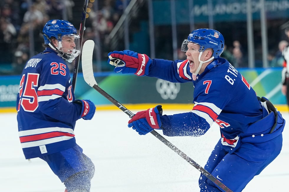 United States' Brady Tkachuk, right, celebrates after scoring his side's second goal during a...