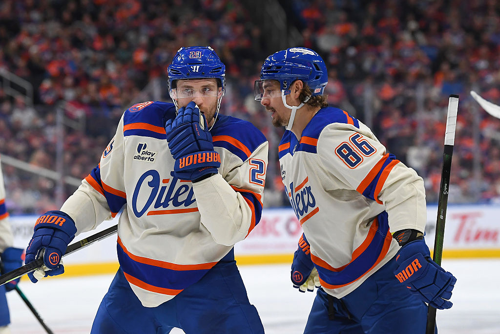 EDMONTON, CANADA - OCTOBER 28: Leon Draisaitl #29 and David Tomasek #86 of the Edmonton Oilers have a conversation during a stoppage in play in the second period of the game against the Utah Mammoth at Rogers Place on October 28, 2025, in Edmonton, Alberta, Canada. (Photo by Andy Devlin/NHLI via Getty Images)