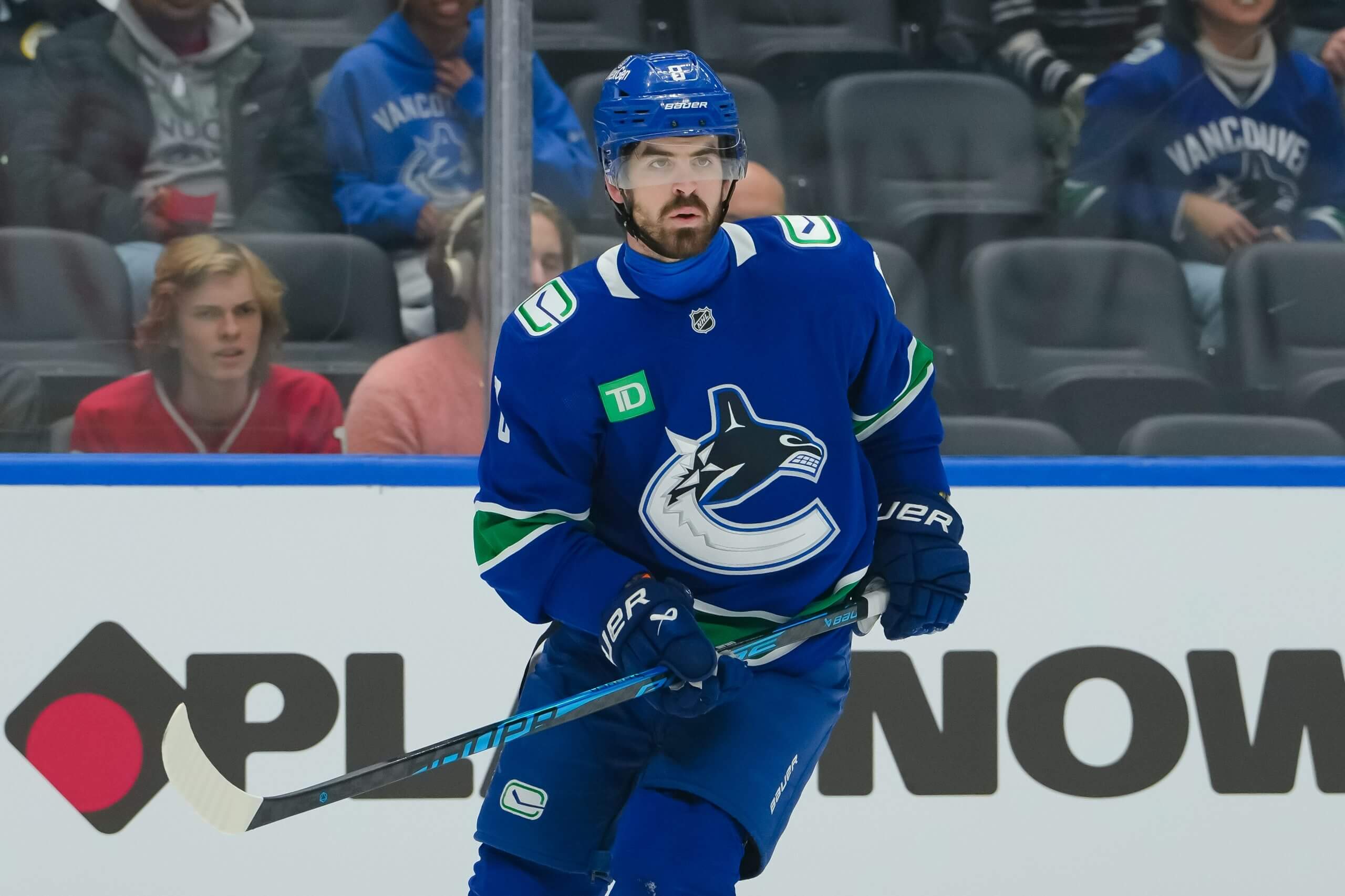 Conor Garland pauses during a Canucks game.