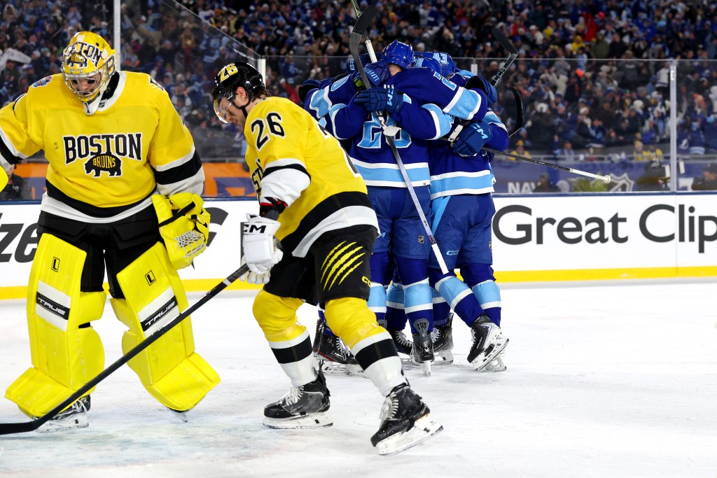 Bruins blow four-goal lead, suffer deflating loss in Stadium Series game