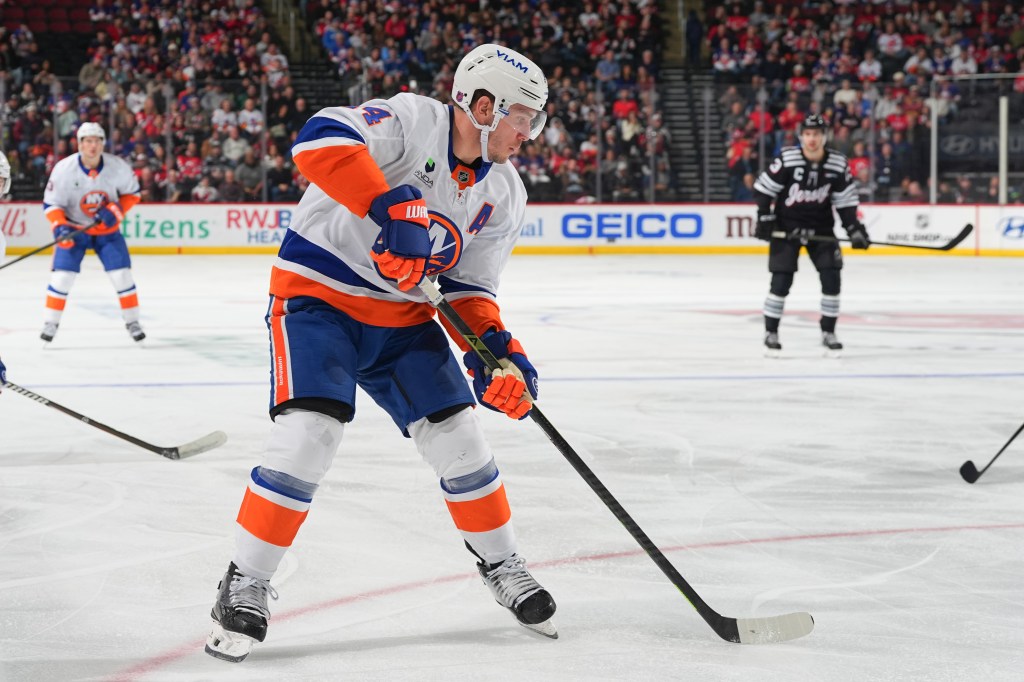 Bo Horvat #14 of the New York Islanders skates during the second  period of the game against the New Jersey Devils on February 5, 2026 at the Prudential Center in Newark, New Jersey.