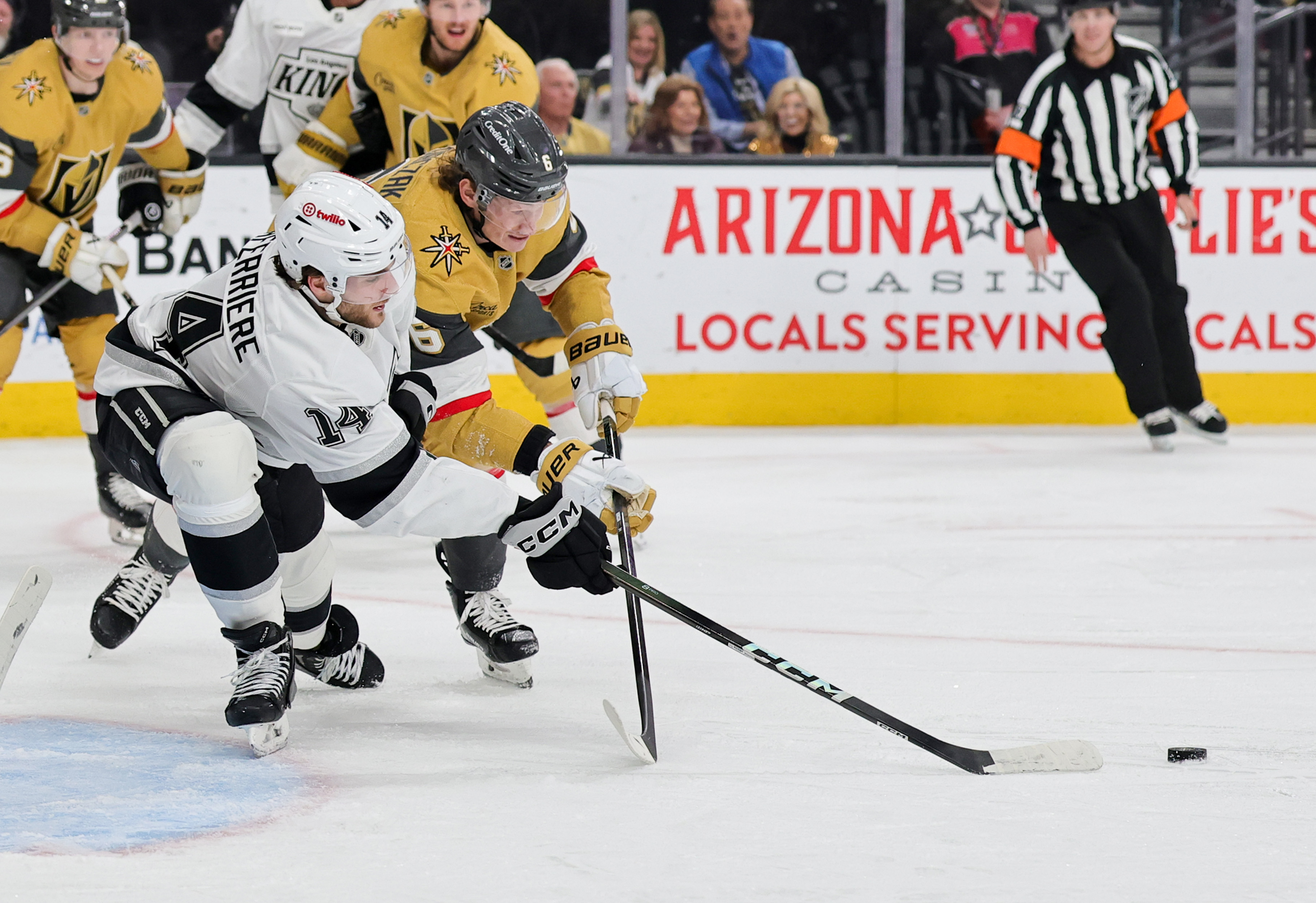 The Kings’ Alex Laferriere (14) and the Vegas Golden Knights’...