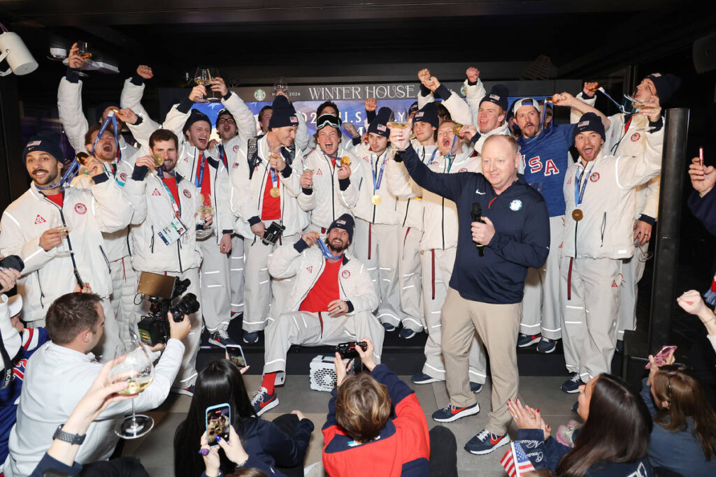 MILAN, ITALY - FEBRUARY 22: The Team USA Men's Hockey Team celebrates their win at Winter House on February 22, 2026 in Milan, Italy.