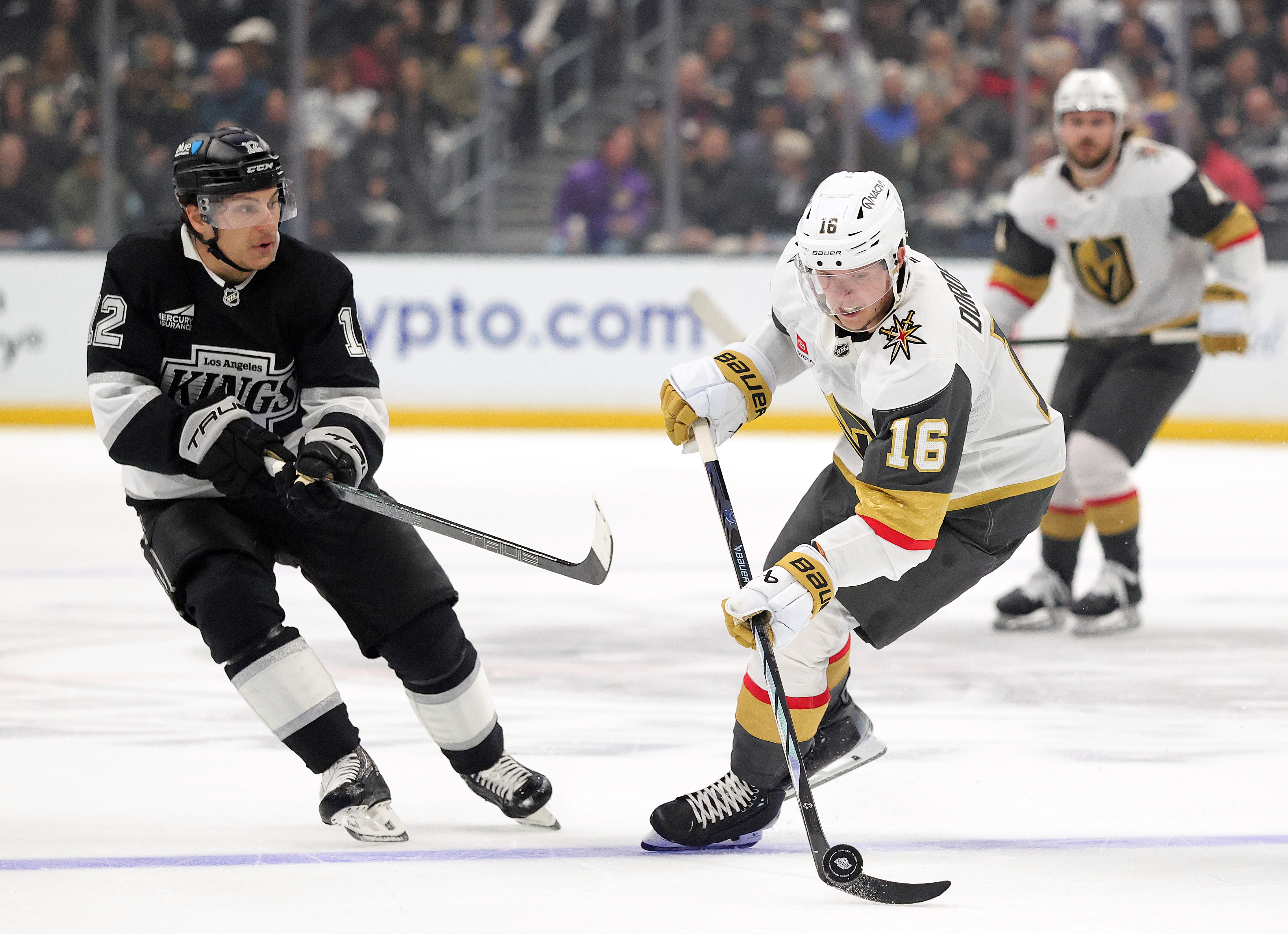 The Vegas Golden Knights’ Pavel Dorofeyev, right, skates with the...