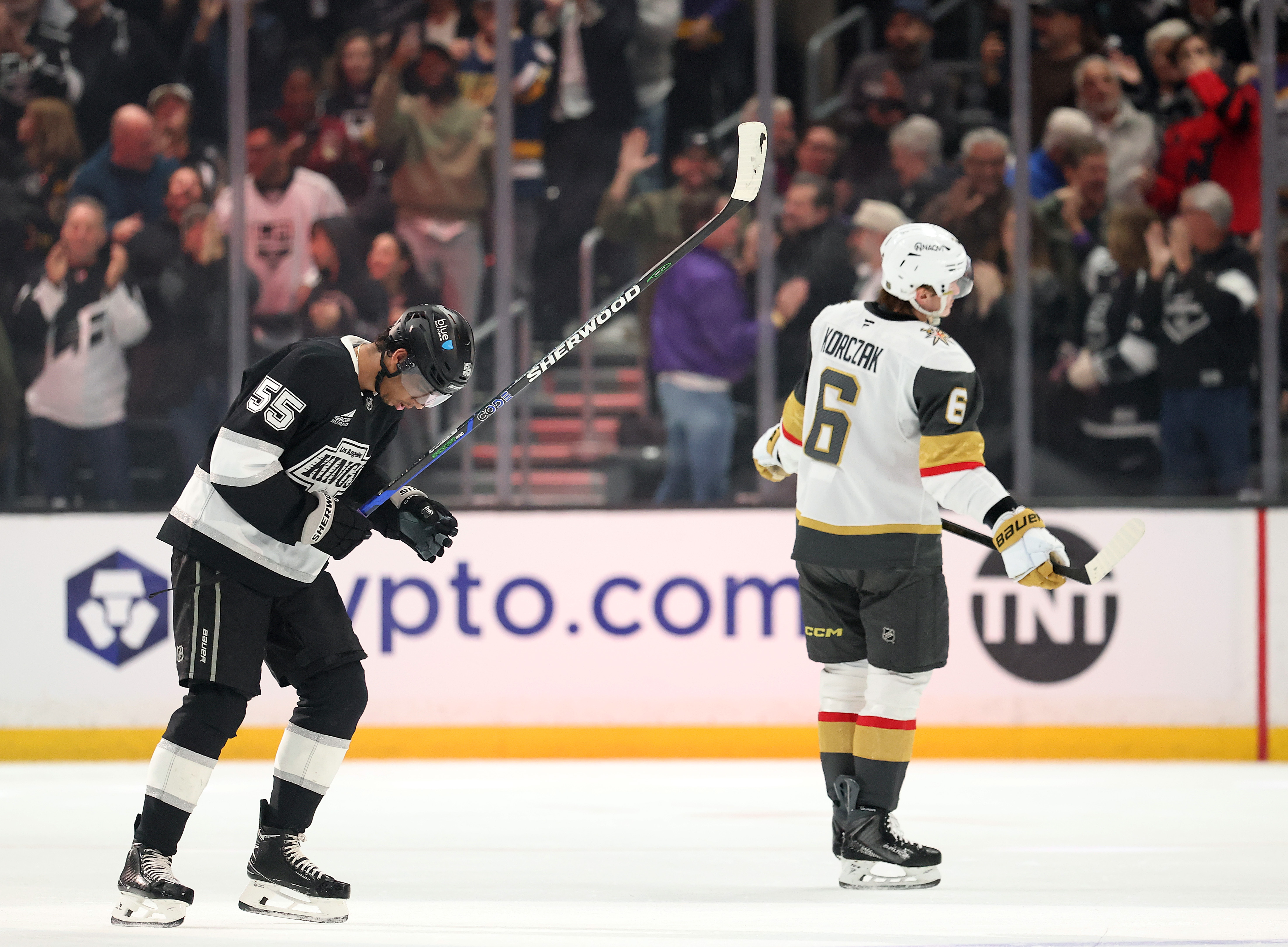 The Kings’ Quinton Byfield, left, celebrates after scoring a goal...