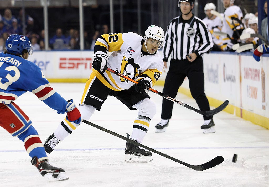 Caleb Jones playing for Pens