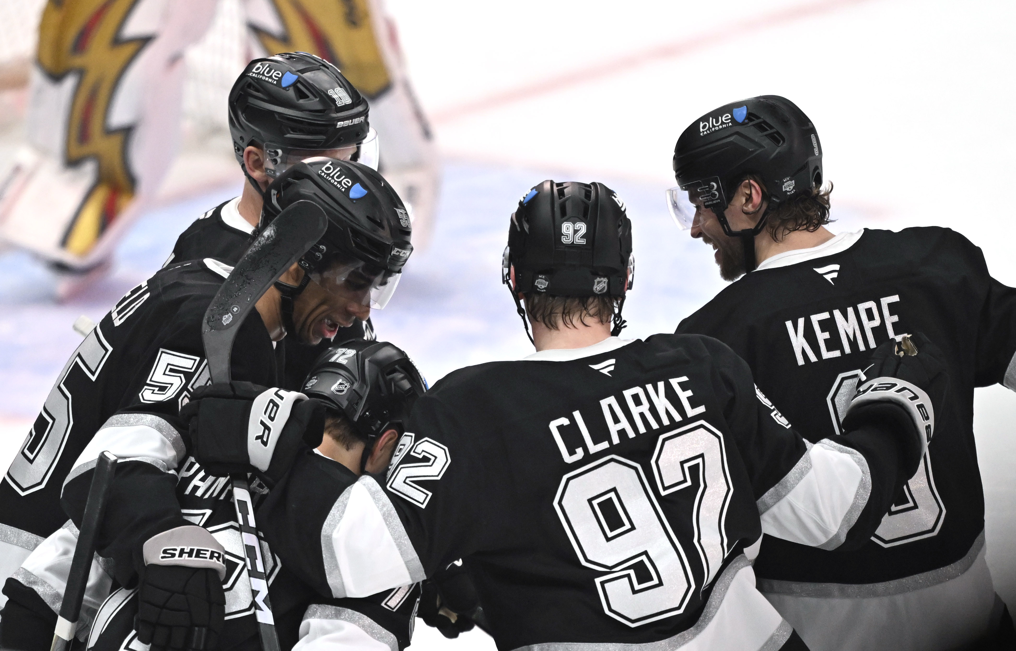 Kings right wing Quinton Byfield (55) celebrates with teammates after...