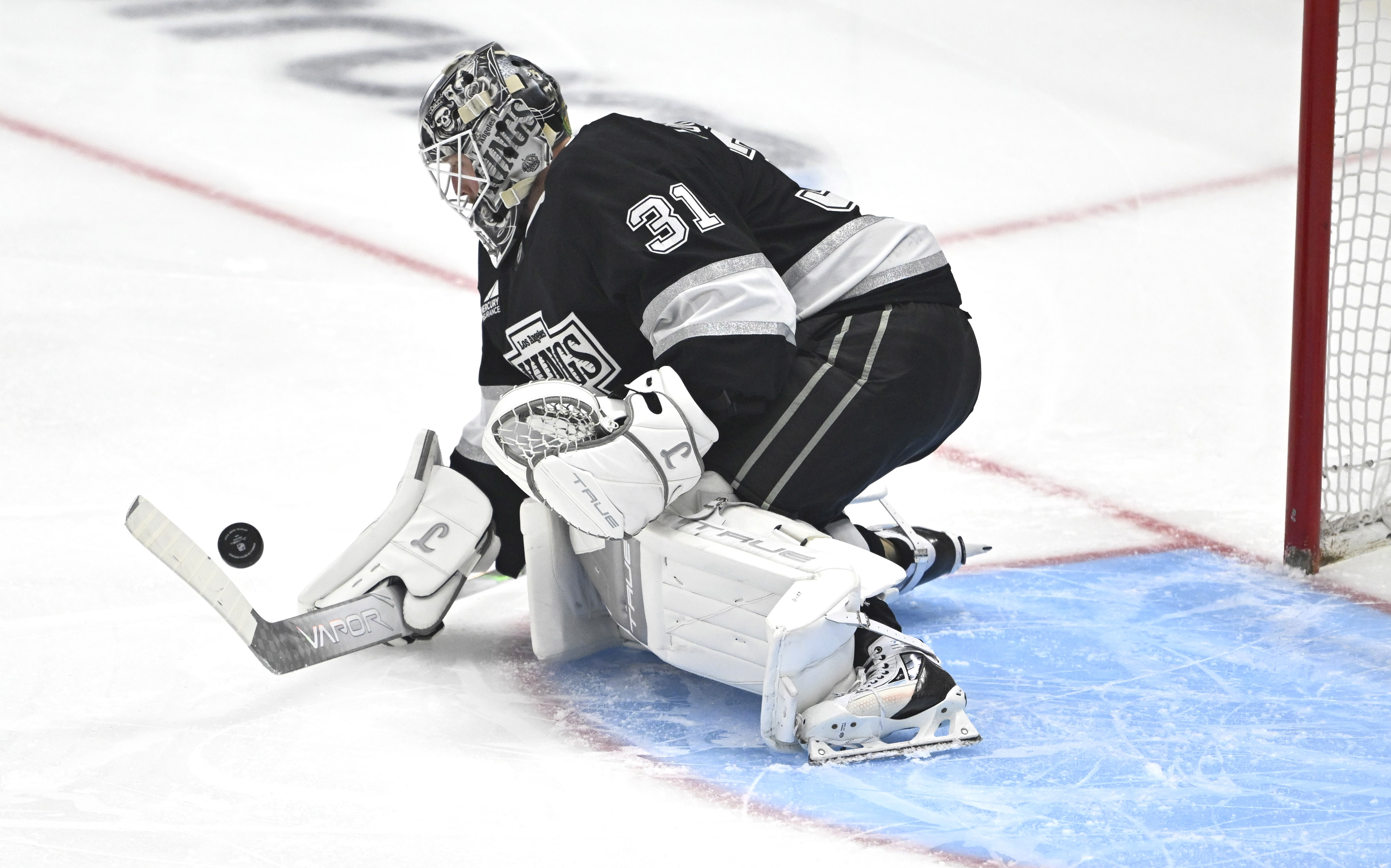 Kings goaltender Anton Forsberg blocks a shot during the first...